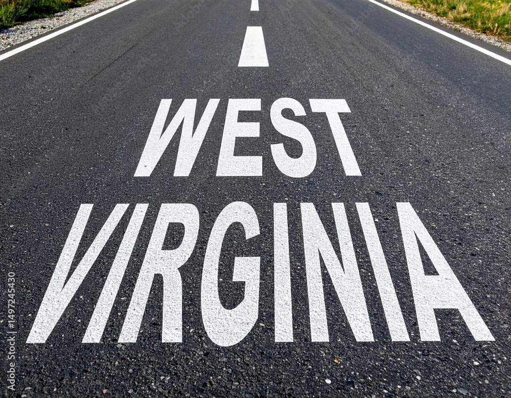 Obraz premium West virginia text on asphalt road with white arrow marking