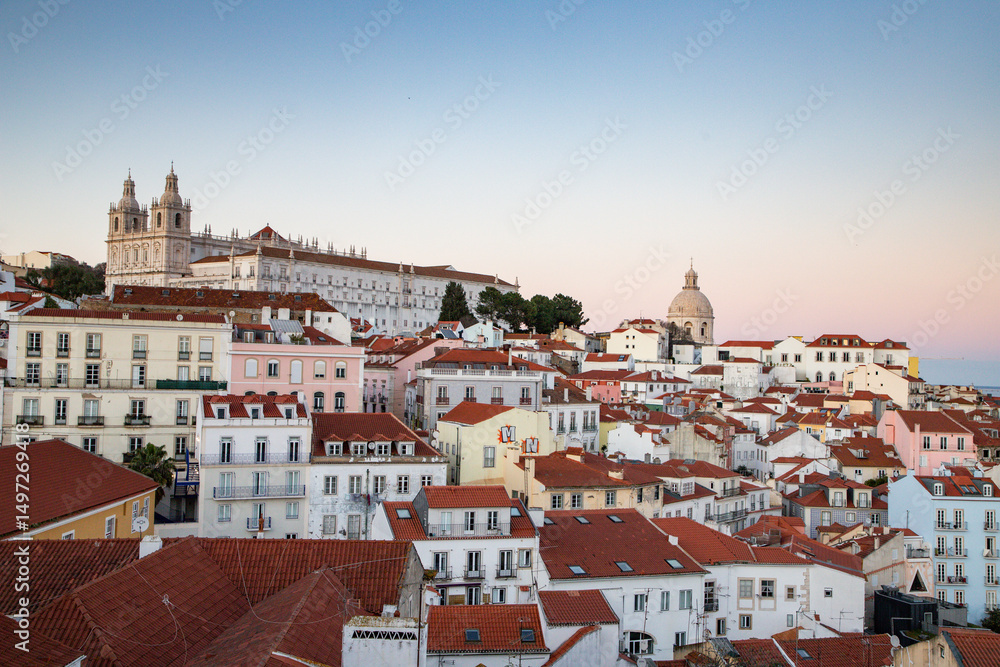Fototapeta premium panoramic view of skyline of Lisbon city, Portugal, many colorful houses in the Alfama district