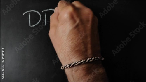 hands of a man writting marketing strategy quotes