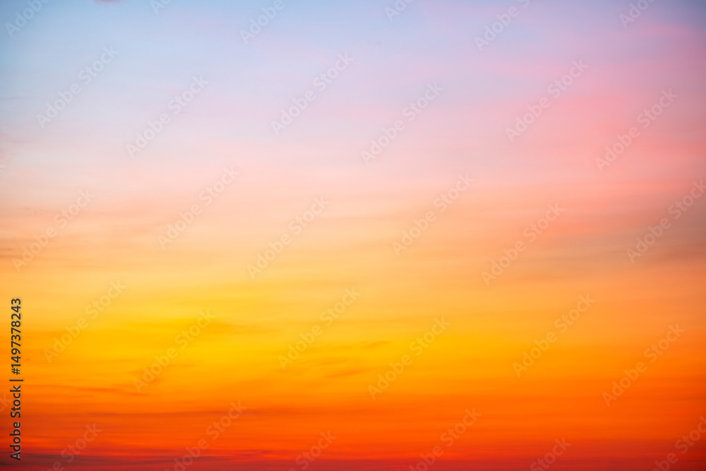 Fototapeta premium Beautiful , luxury soft gradient orange gold clouds and sunlight on the blue sky perfect for the background, take in evening,Twilight, Large size, high definition landscape photo