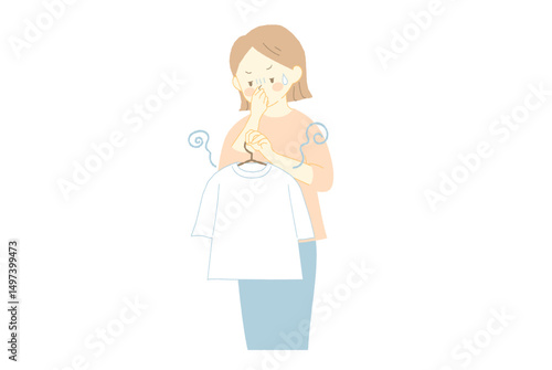洗濯物から嫌な匂いがして鼻を押さえる女性のイラスト
