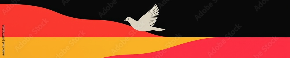 Fototapeta premium A bird is flying over a red, yellow, and black flag