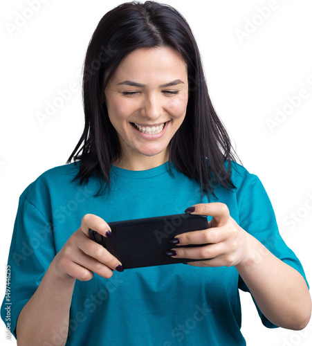 Front portrait of young smiling woman using mobile phone against grey background
