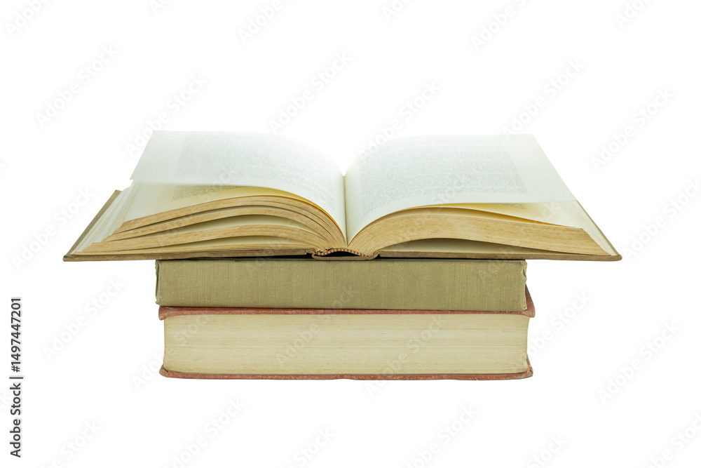 Old books are stacked and open isolated on white background with clipping path. Old books are stacked and open isolated on white background with clipping path.