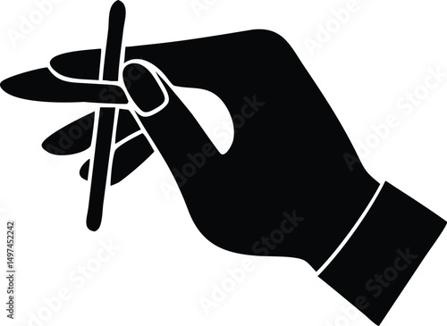 A monochrome hand holds a small stick delicately against a white backdrop