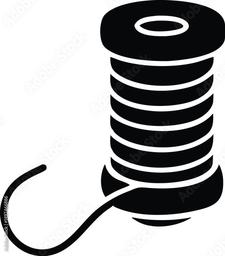 A black thread spool features visible loose thread with a transparent backdrop