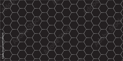 Abstract grey metal grid with a seamless hexagonal honeycomb pattern creates a modern technology texture design