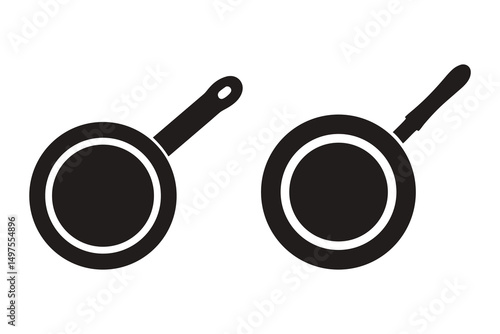 Two different black fry pans are shown against a simple white backdrop