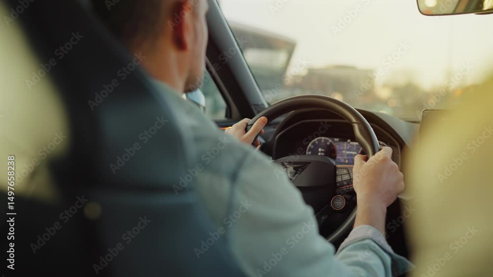 Man driving car through the streets of the city. Slow motion Man driving car through the streets of the city. Slow motion