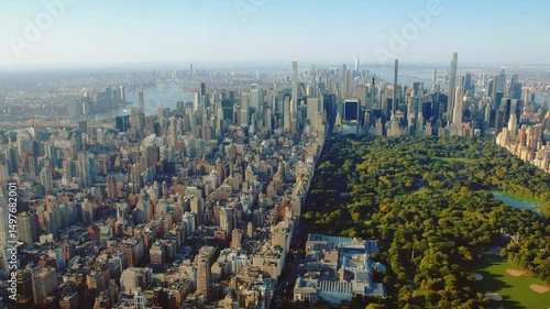 Aerial Overview Of Central Park, Midtown Manhattan Skyline. Billionaires Row, New York City. Serene Water Bodies And Natural And Architectural Beauty. High Quality Content Shot from Helicopter.