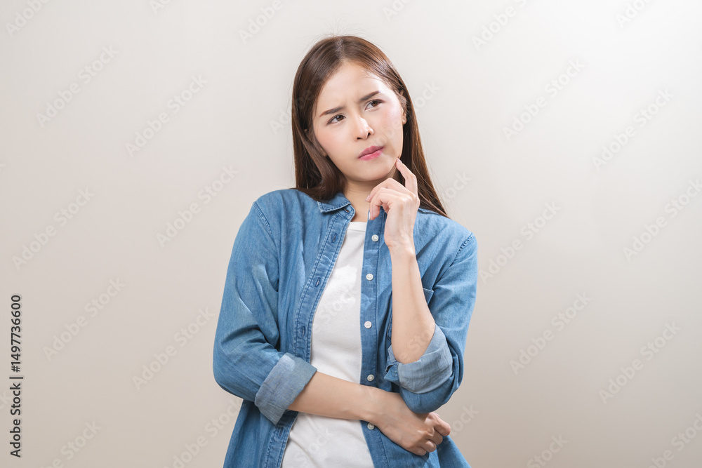 Portrait of face expression stress, asian young woman, confused girl standing pose looking camera in casual. unhappy female thinking creative, thinks about problem, isolated on background, copy space. Portrait of face expression stress, asian young woman, confused girl standing pose looking camera in casual. unhappy female thinking creative, thinks about problem, isolated on background, copy space.