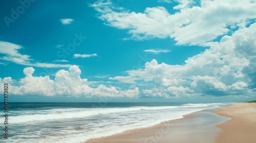 Serene Beachscape Wide Angle Composition, Coastal Cloudscape, Ocean Waves, Sandy Shore, Summer Vacation. Beach, Ocean, Clouds