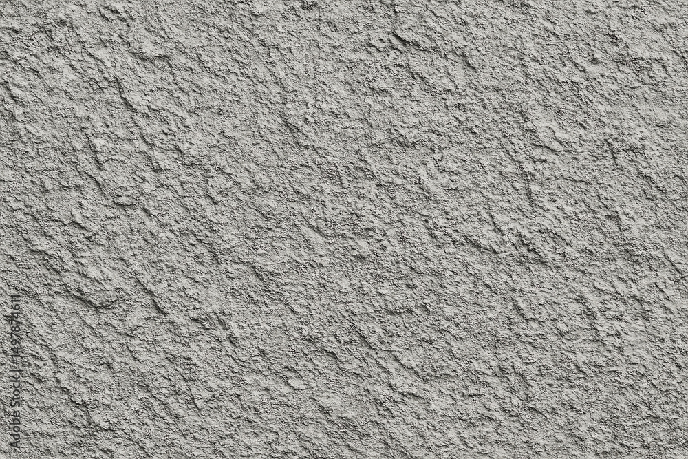 Fototapeta premium A close-up texture of gray stucco, showcasing its rough surface and intricate patterns. Perfect for backgrounds, design projects, or architectural themes in various applications.