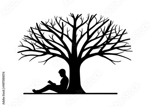 Silhouette of a person reading under a bare tree
