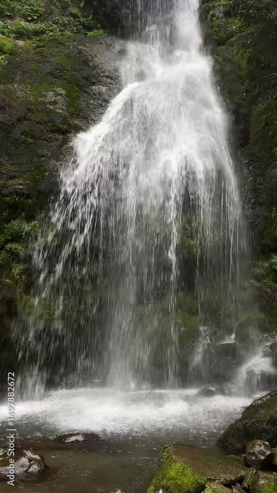 A small mountain waterfall A small mountain waterfall