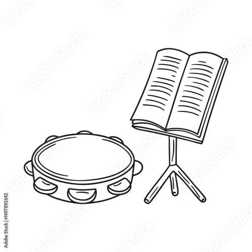 A tambourine resting near a music stand with sheet notes