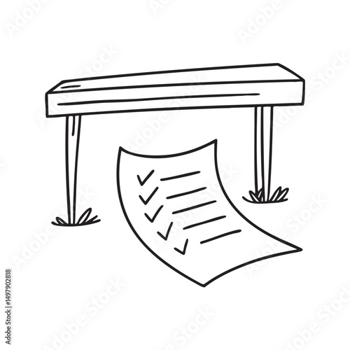 A task page lying on the floor under a table