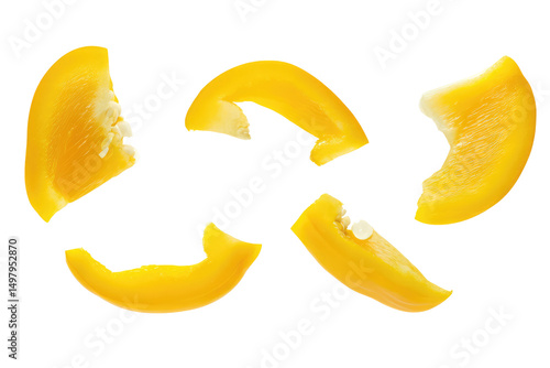 Wallpaper Mural Isolated yellow bell pepper slices arranged on a black background in a studio setting for food photography Torontodigital.ca