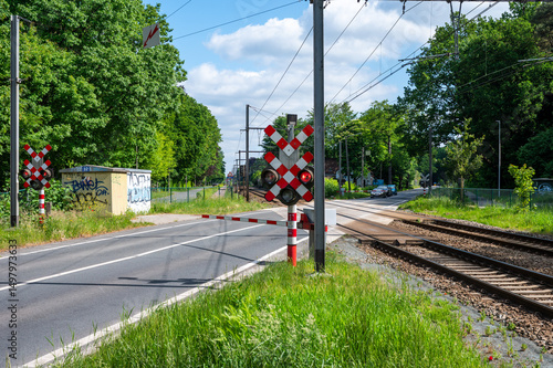 Obraz na plátně Railway crossing on local track in Kapellen, Antwerp, Belgium