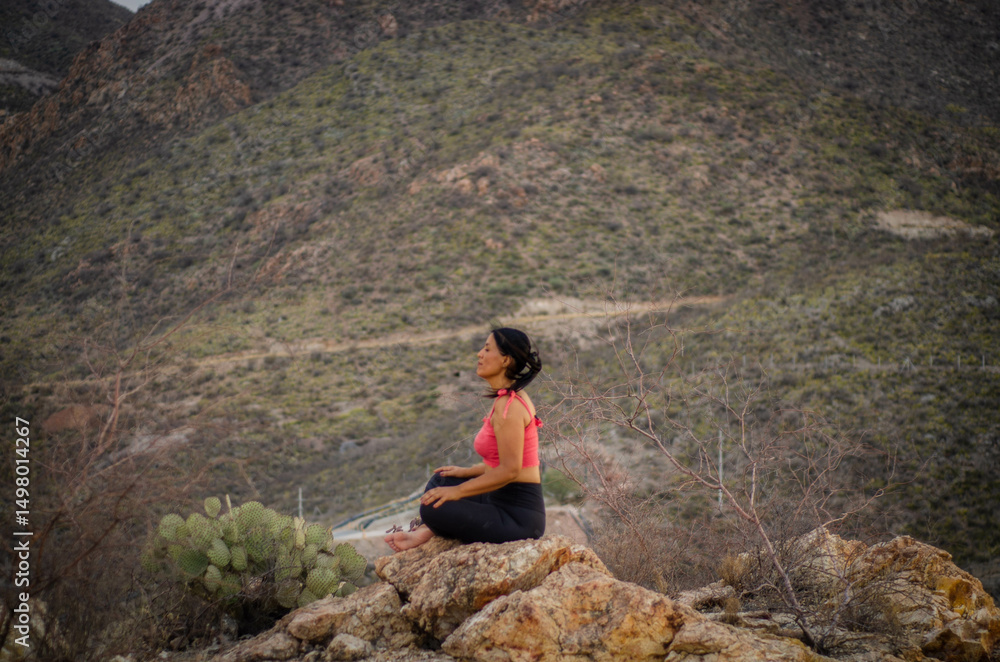 Naklejka premium woman doing yoga in the afternoon