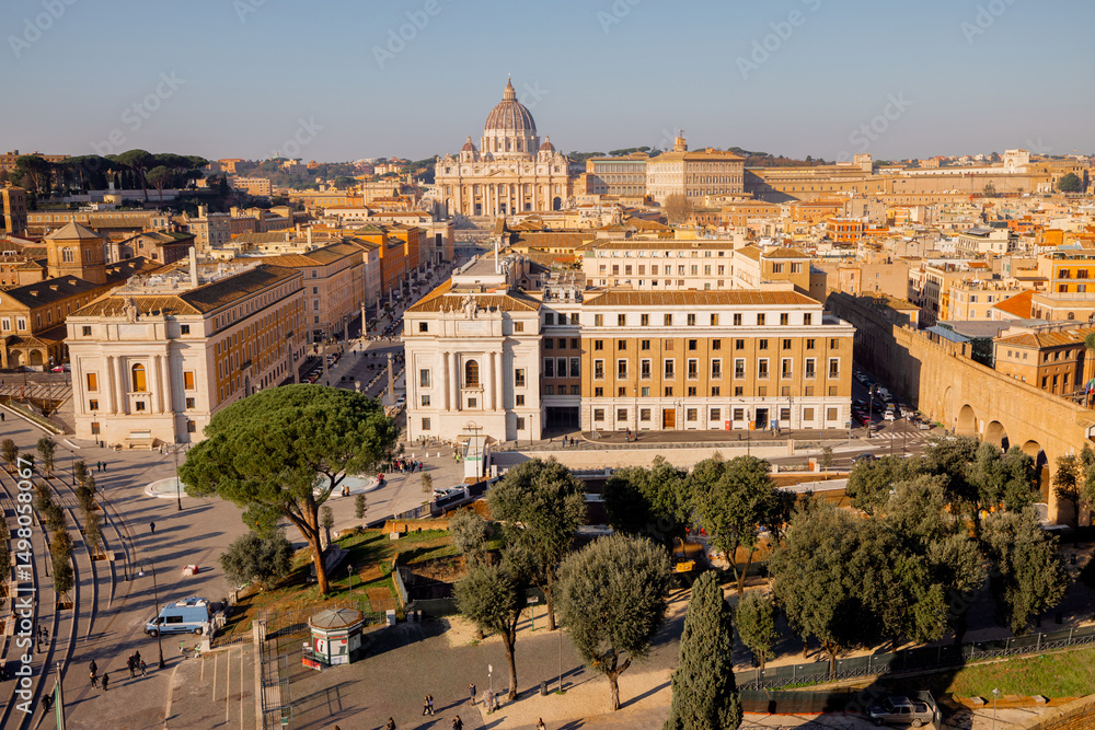 Obraz premium A peaceful morning in Rome, where birds soar over the Tiber River and the grand dome of St. Peters Basilica stands proudly in the distance, captured from Castel Sant Angelo