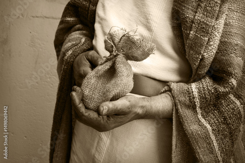 Male hands holding a bag