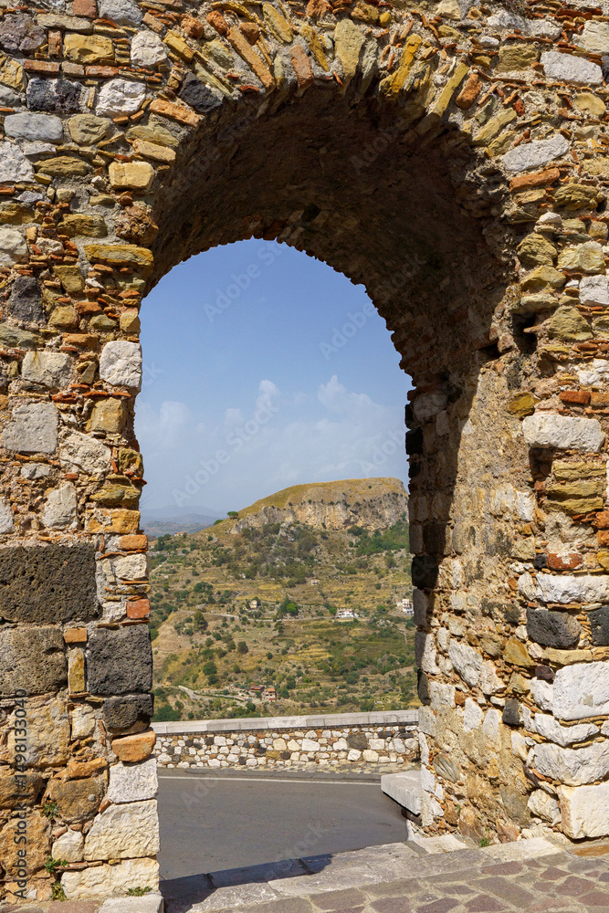 Fototapeta premium View through Arco Romano an ancient roman arch