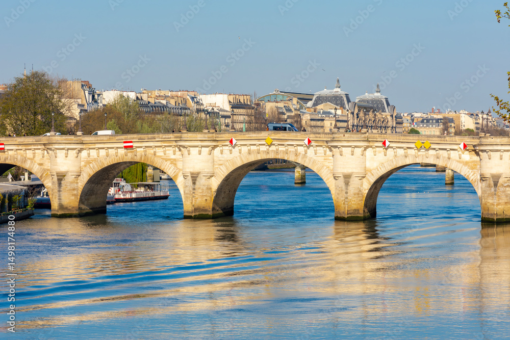 Fototapeta premium Pont Neuf - oldest bridge over Seine river in Paris, France