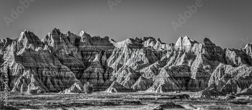 The wind and water eroded landscape in the Badlands National Park seem desolate but make for beautiful natural carvings. USA