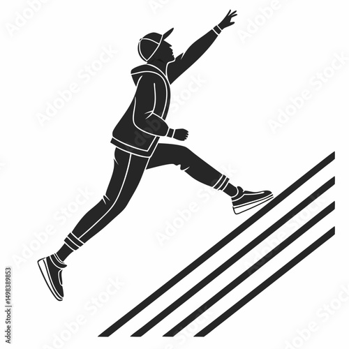 Young man leaping upward reaching for goal