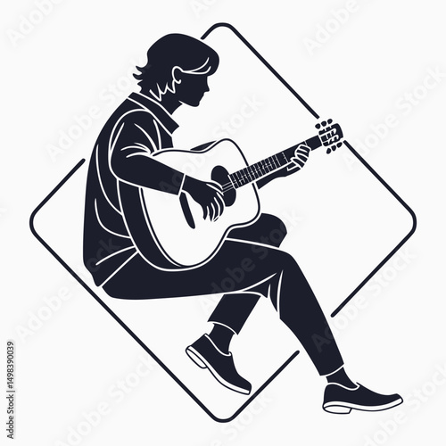 Young man playing acoustic guitar silhouette