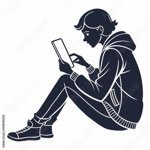 Young person sitting floor using tablet device