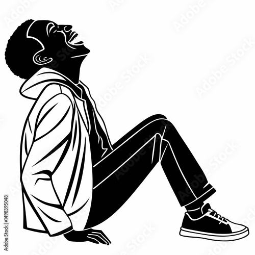 Happy black man laughing sitting down silhouette