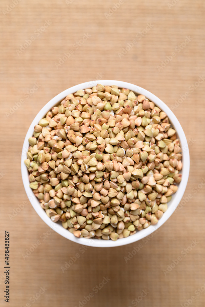 Organic buckwheat seed in bowl, Food ingredient, Top view Organic buckwheat seed in bowl, Food ingredient, Top view