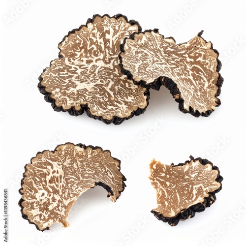 Fresh truffle shavings on white background with full depth of field for gourmet cuisine or luxury food concept