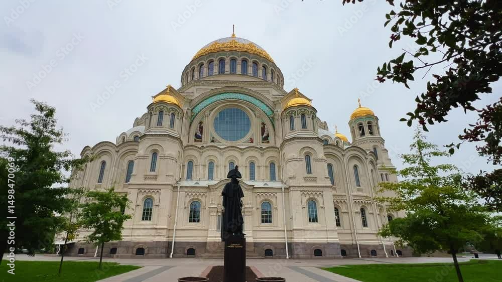 KRONSTADT, Russia - September 14, 2024: St. Nicholas Naval Cathedral. The Kronstadt Naval Cathedral on Yakornaya Square in cloudy weather in autumn. Autumn Kronstadt. Kotlin Island. 4K KRONSTADT, Russia - September 14, 2024: St. Nicholas Naval Cathedral. The Kronstadt Naval Cathedral on Yakornaya Square in cloudy weather in autumn. Autumn Kronstadt. Kotlin Island. 4K