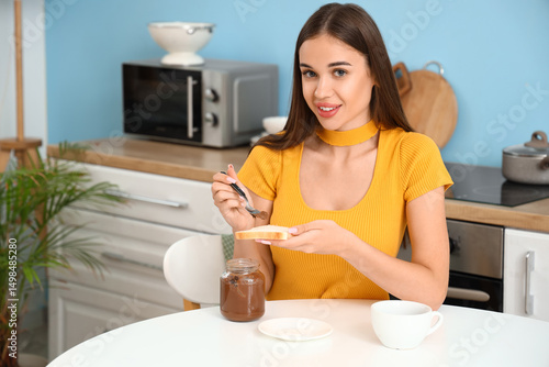 Young woman with chocolate ...