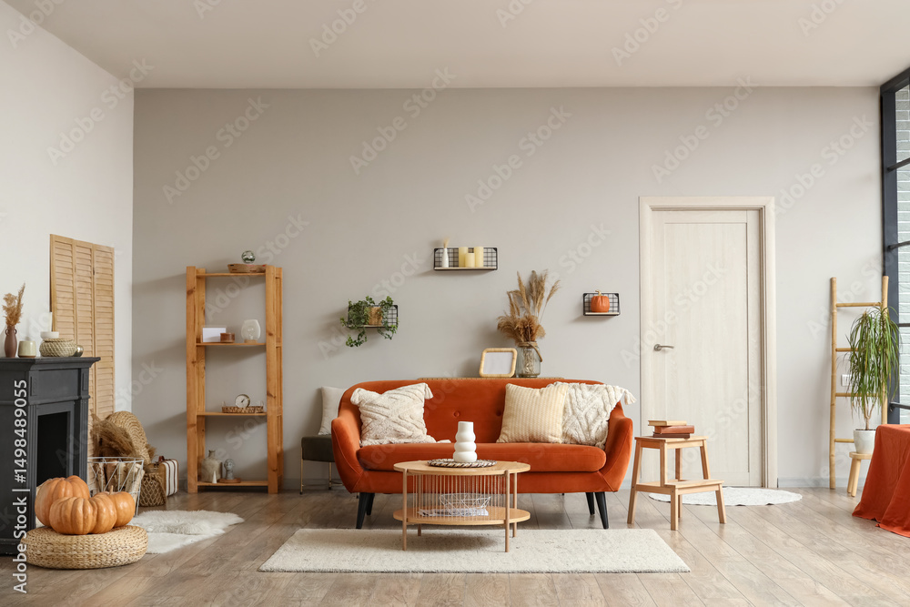 Obraz premium Interior of modern living room with fireplace and brown sofa