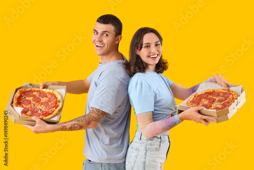 Young couple with tasty pep...