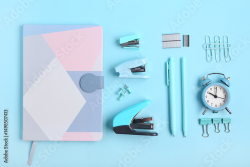 Blue staplers with staples,...