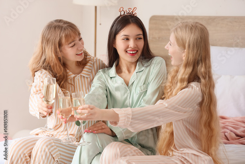Young woman and her bridesm...