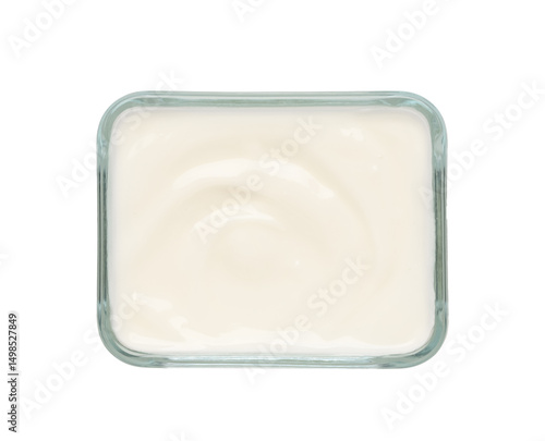 Glass bowl of tasty yogurt on white background