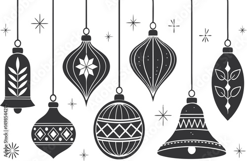 Elegant black and white holiday ornaments hanging with decorative stars.