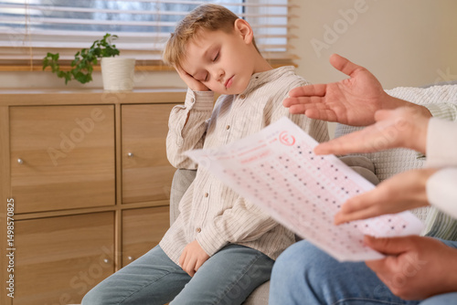 Parents scolding their litt...