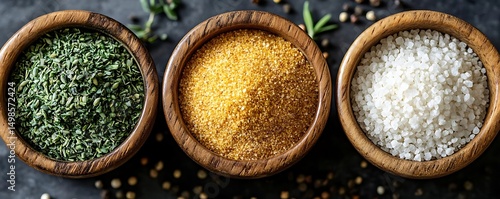 Herbs, spices, salt bowls, dark background, food photography