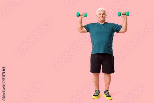 Sporty senior man exercisin...