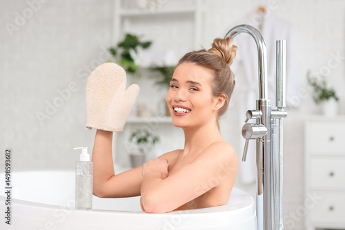 Happy young woman with mass...