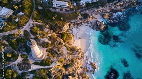 Obraz na płótnie Coastal lighthouse, beach, and turquoise water. Aerial view of a scenic coastal landscape w salonie