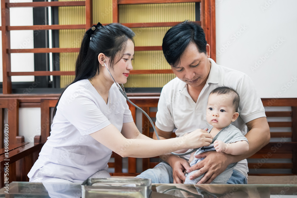 Health assessment of an infant by a physician in a clinic setting with a parent present Health assessment of an infant by a physician in a clinic setting with a parent present