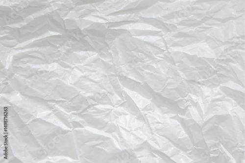 Old, blank, and rough crumpled paper surface with a textured and creased pattern